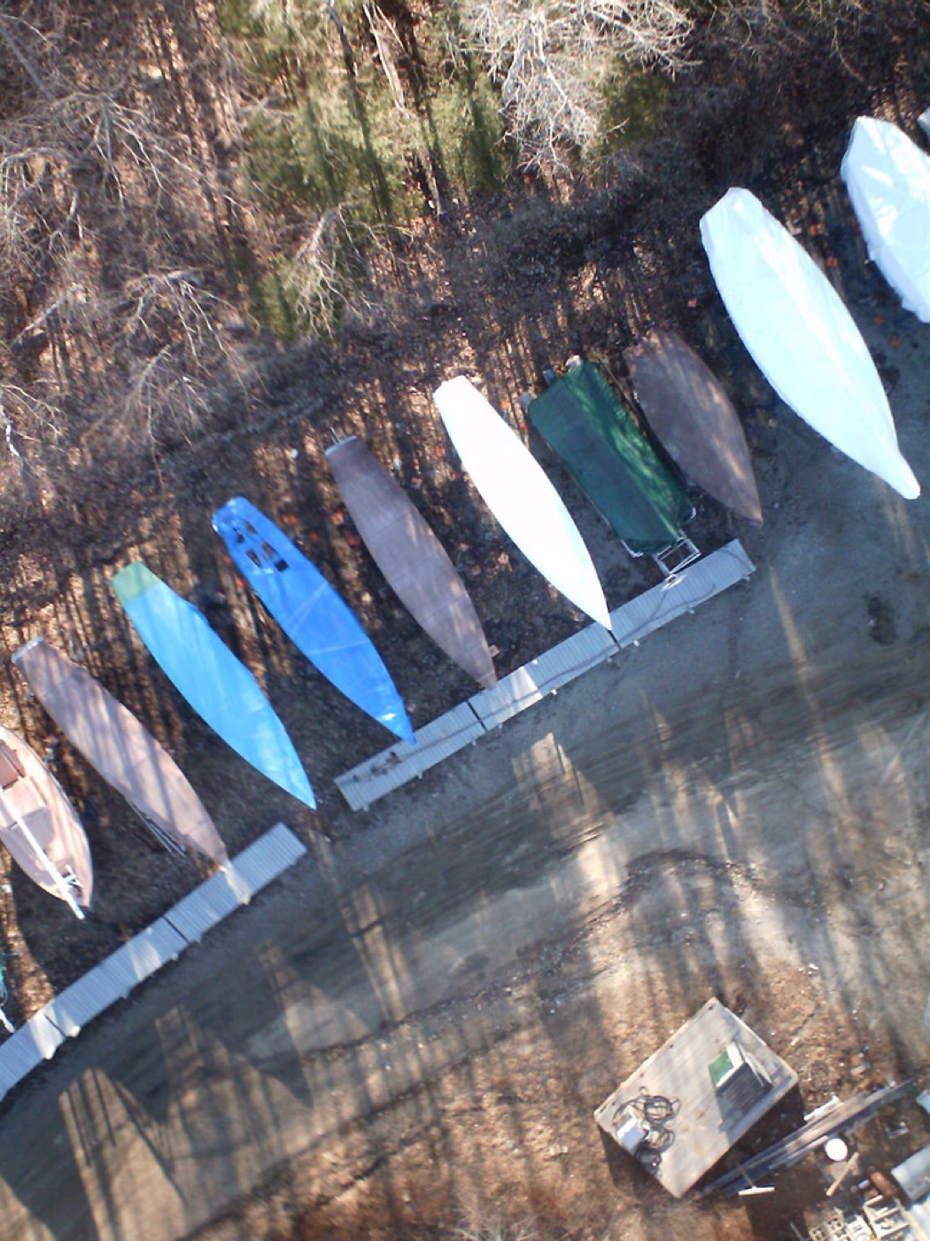 Boats fitted with fabric covers in storage