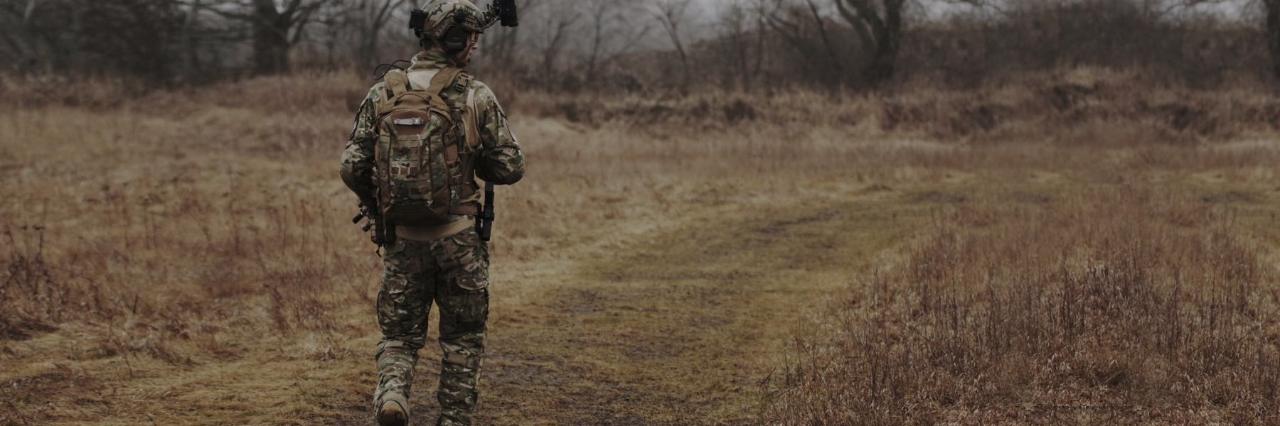 Soldier in field with canvas backpack - defence fabrics