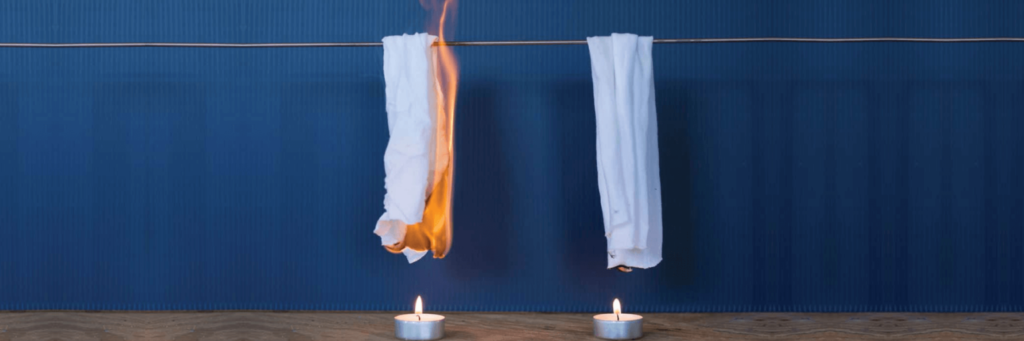 Flame test comparing flame retardant fabric with ordinary fabric