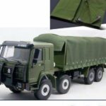 Olive green canvas tarpaulin used as a truck cover, with eyelet edge detail